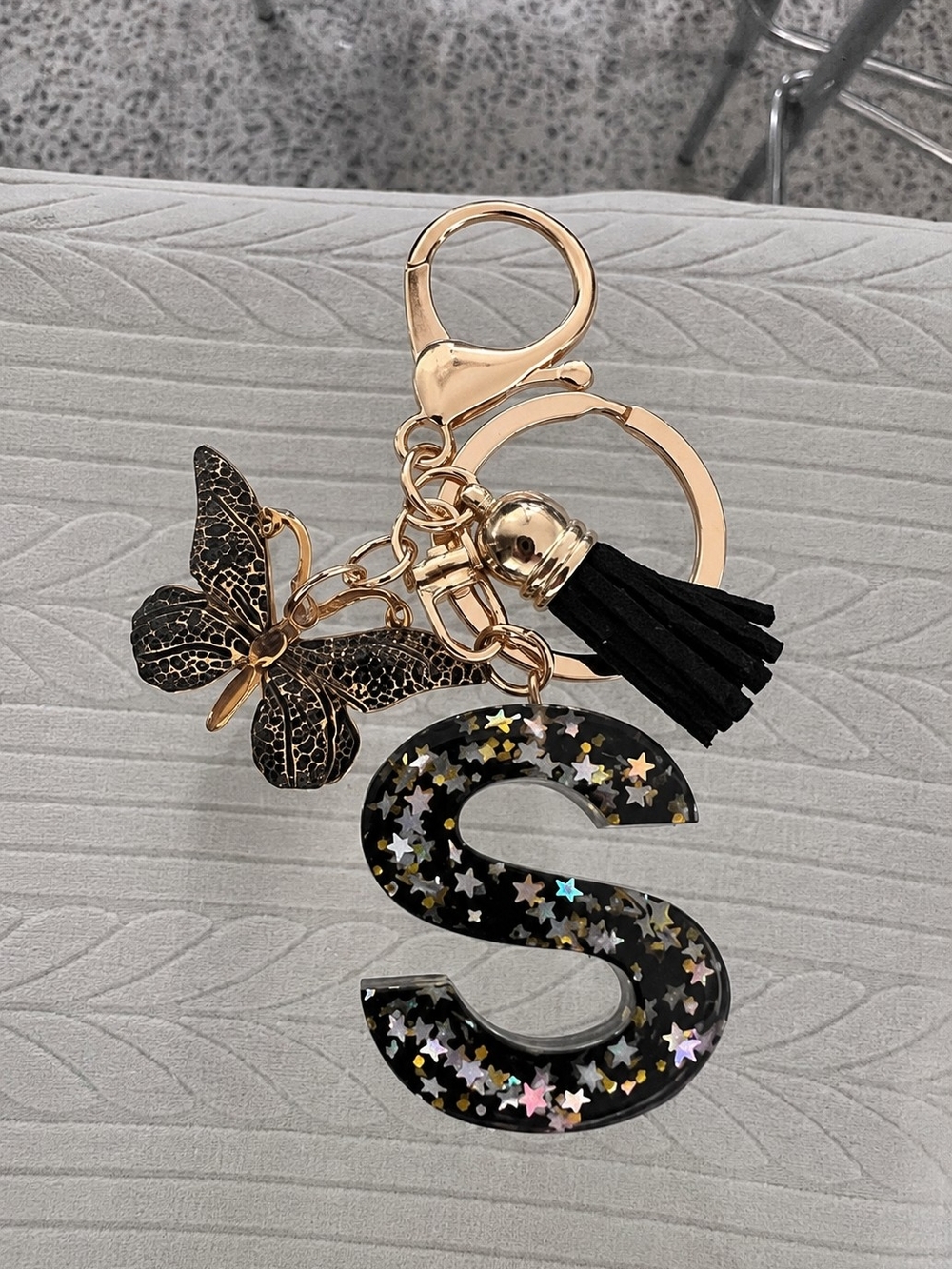 Gold-Tone Butterfly & Black Star Initial 'S' Keychain with Tassel